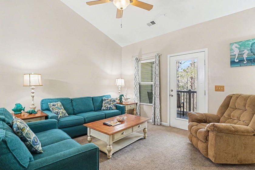 Welcome to this beautifully furnished third-floor condo located - photo 3