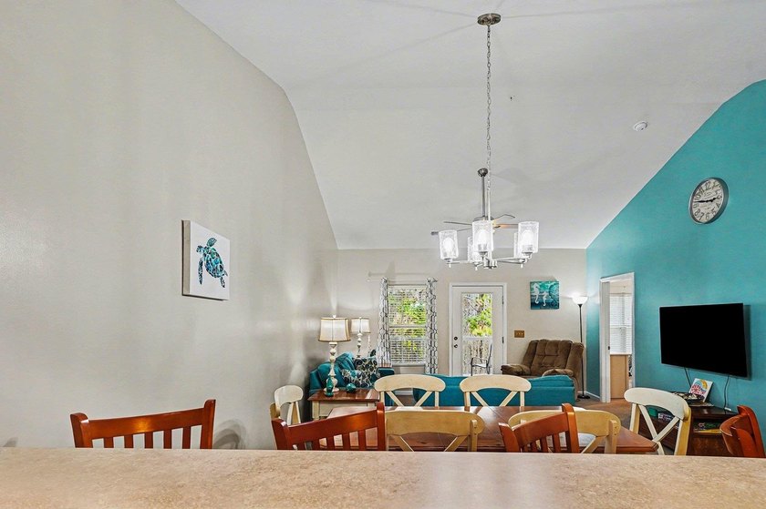 Welcome to this beautifully furnished third-floor condo located - photo 5