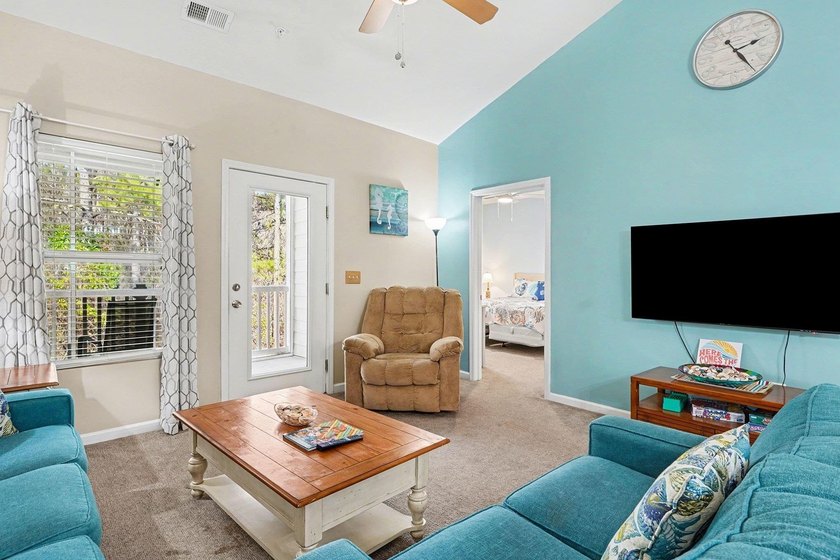Welcome to this beautifully furnished third-floor condo located - photo 8