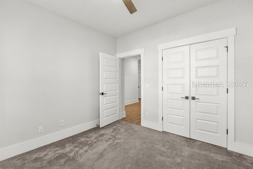 Tucked away on a private, wooded lot, this stunning single-story - photo 13