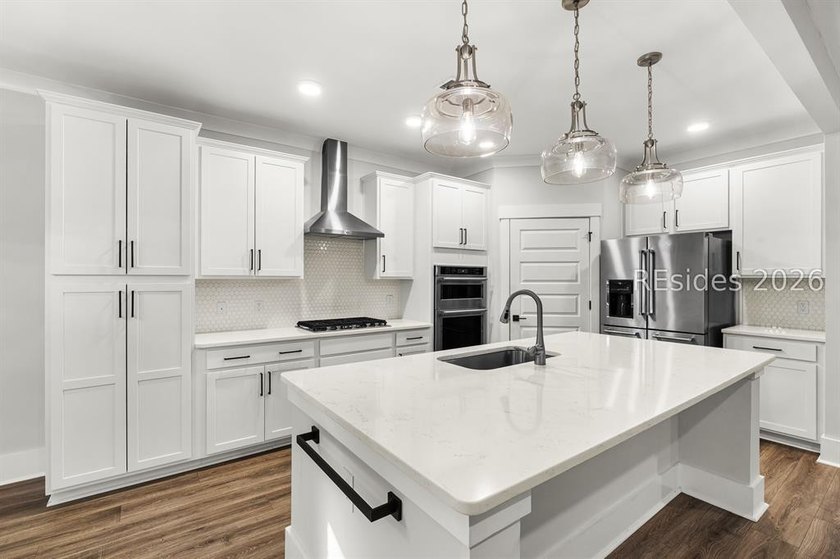 Tucked away on a private, wooded lot, this stunning single-story - photo 26