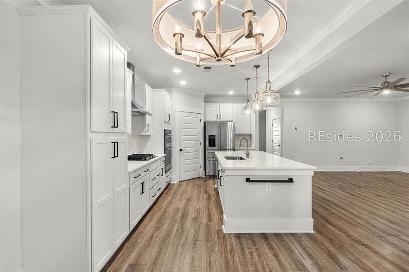 Tucked away on a private, wooded lot, this stunning single-story - photo 27