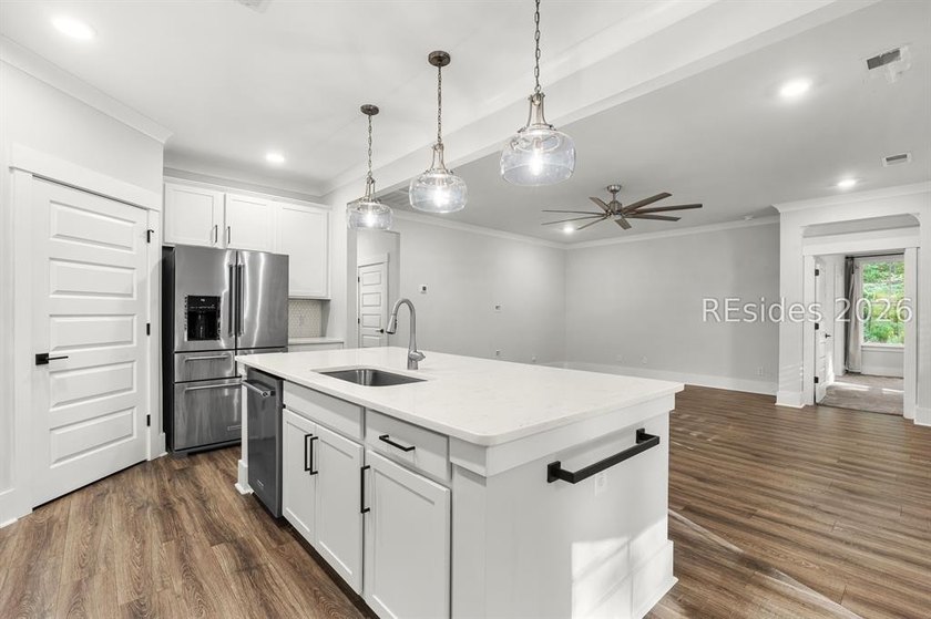 Tucked away on a private, wooded lot, this stunning single-story - photo 29