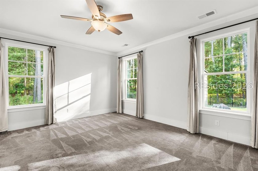 Tucked away on a private, wooded lot, this stunning single-story - photo 32