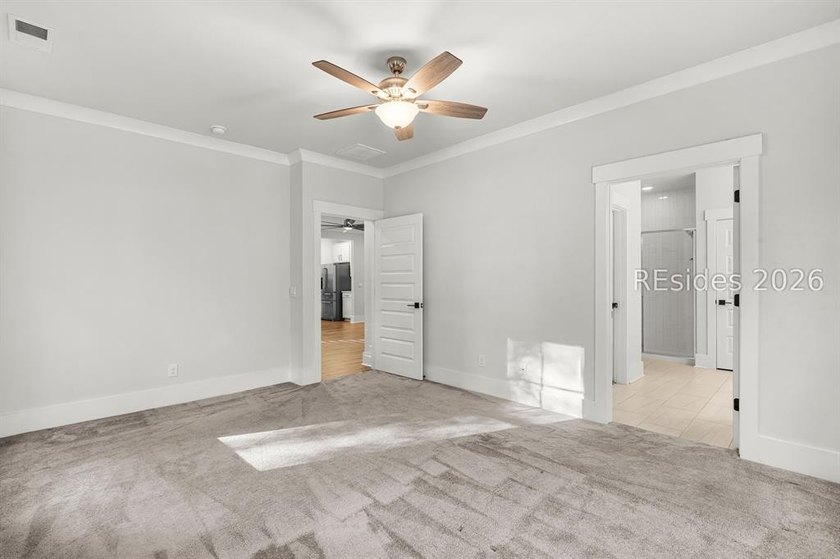 Tucked away on a private, wooded lot, this stunning single-story - photo 34