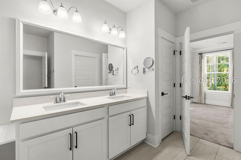 Tucked away on a private, wooded lot, this stunning single-story - photo 35