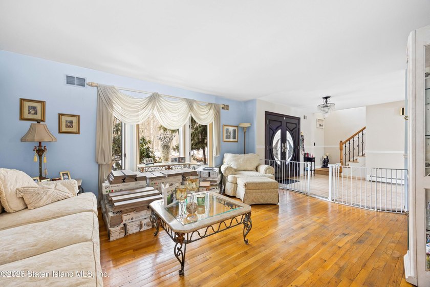 This Arden Heights center hall colonial will sell via auction on - photo 4
