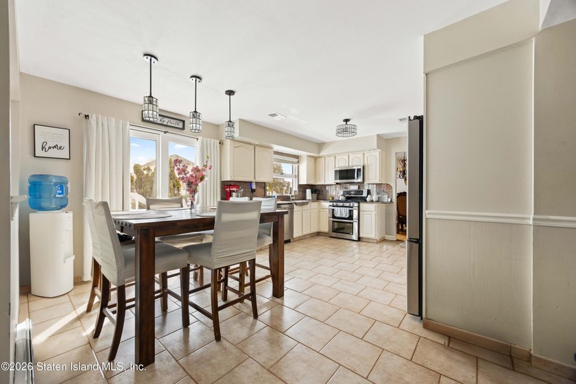 This Arden Heights center hall colonial will sell via auction on - photo 6