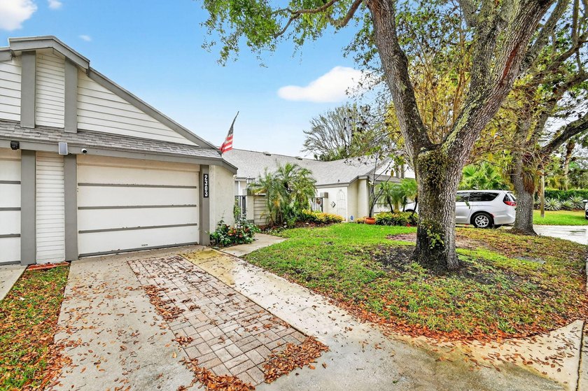 Discover this inviting 2-bedroom, 2-bath villa with 1-car garage - photo 3