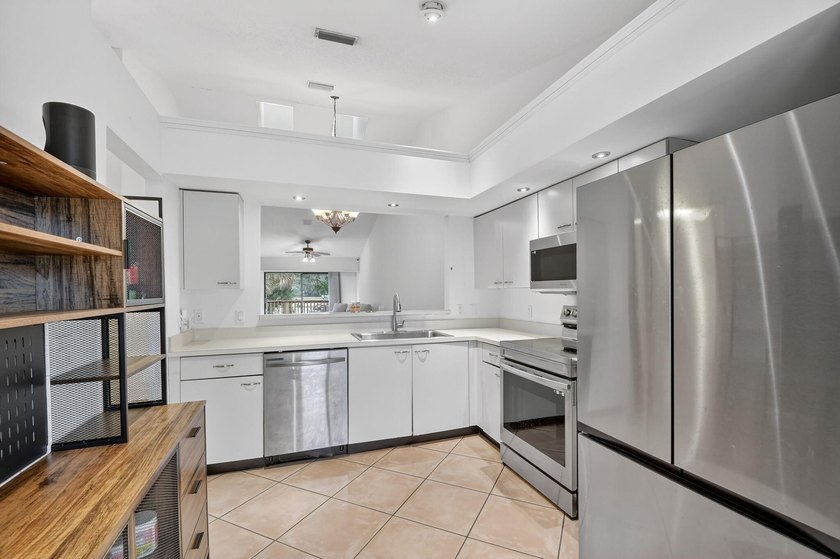 Discover this inviting 2-bedroom, 2-bath villa with 1-car garage - photo 9