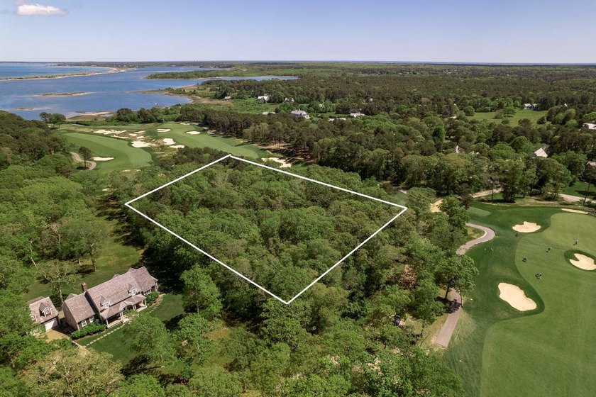 A rare opportunity to own a 2.4-acre buildable lot within the - photo 2