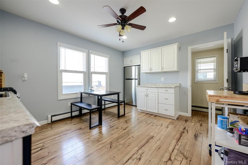 Welcome to this beautifully renovated raised ranch in Long - photo 14
