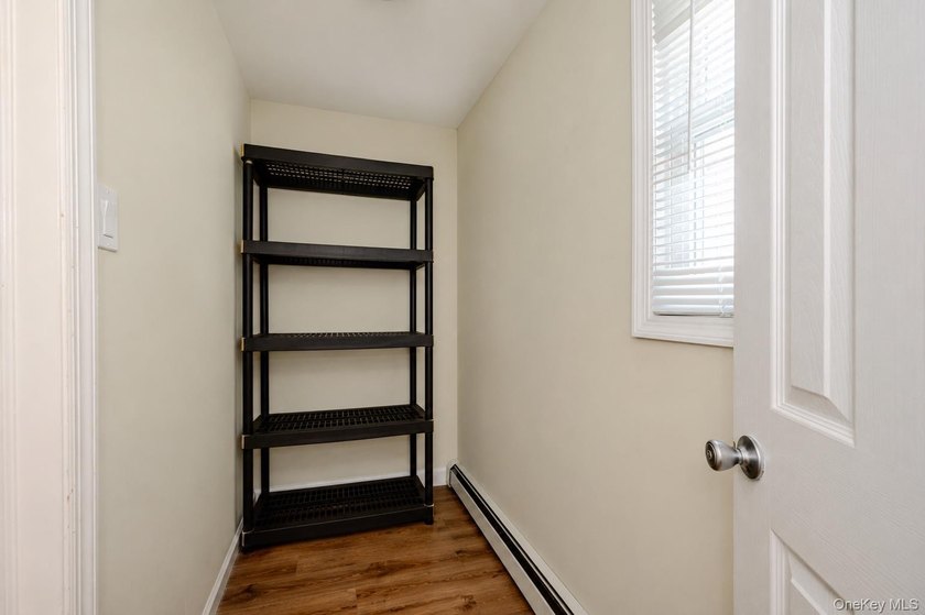 Welcome to this beautifully renovated raised ranch in Long - photo 15