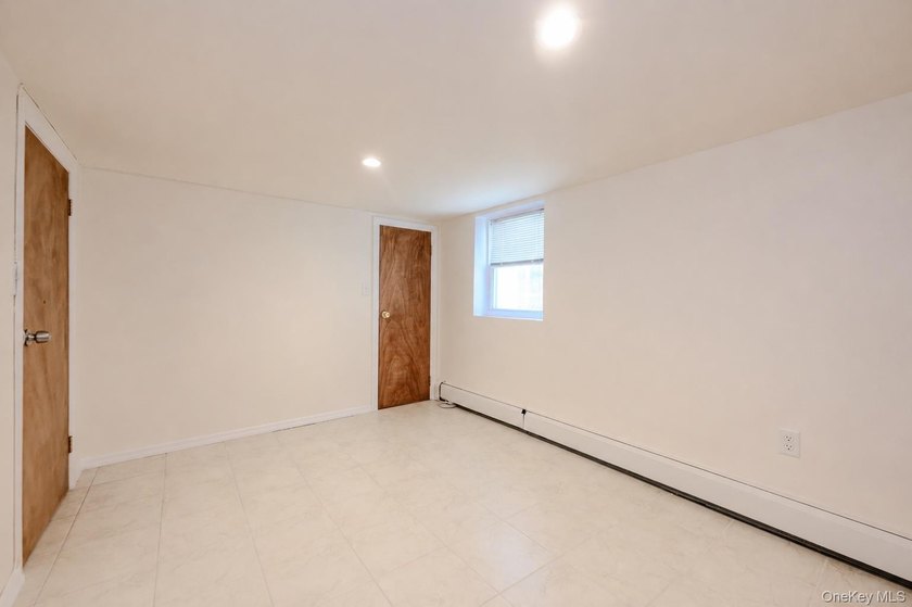 Welcome to this beautifully renovated raised ranch in Long - photo 19