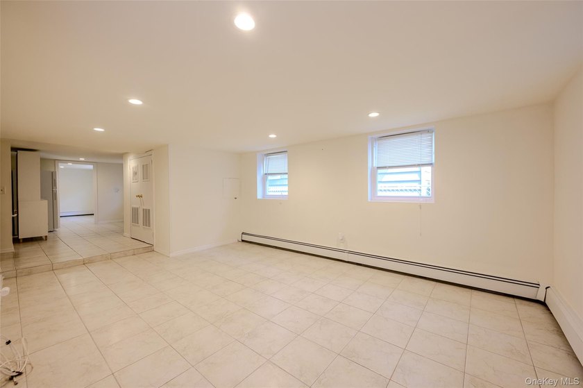 Welcome to this beautifully renovated raised ranch in Long - photo 21