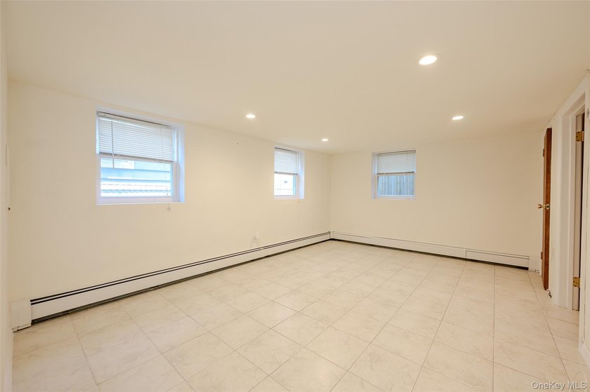 Welcome to this beautifully renovated raised ranch in Long - photo 22