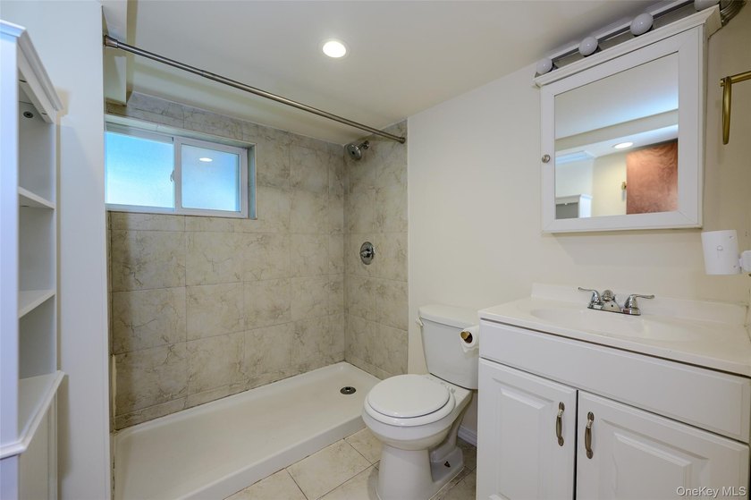 Welcome to this beautifully renovated raised ranch in Long - photo 25