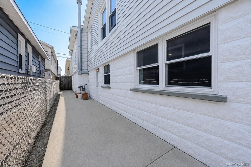 Welcome to this beautifully renovated raised ranch in Long - photo 33