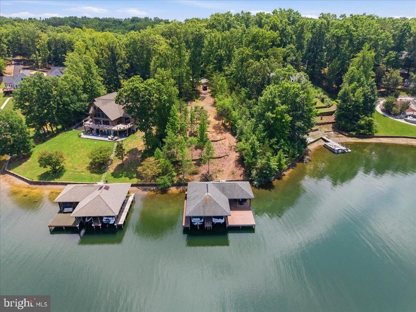 Remarkable waterfront lot! 3 stall Boathouse with huge sunning - photo 47