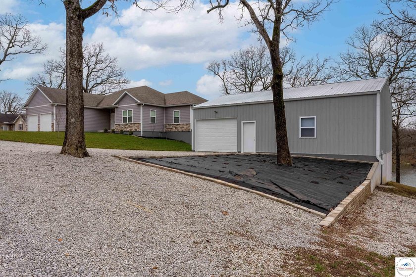 This expansive home in Warsaw, MO. Near Truman Lake and Lake of - photo 2