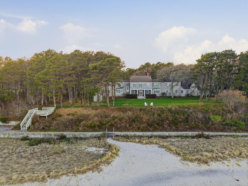 In the lovely enclaves of Cotuit, Ma, positioned on a - photo 6