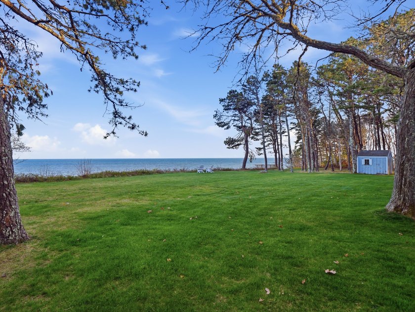 In the lovely enclaves of Cotuit, Ma, positioned on a - photo 10