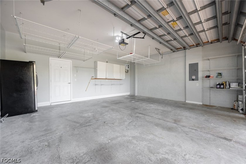 The spacious, open-concept floor plan features two living areas - photo 31