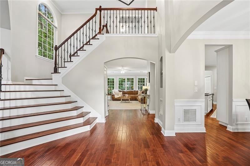 Welcome home to 6930 Olde Atlanta Parkway, where refined living - photo 10