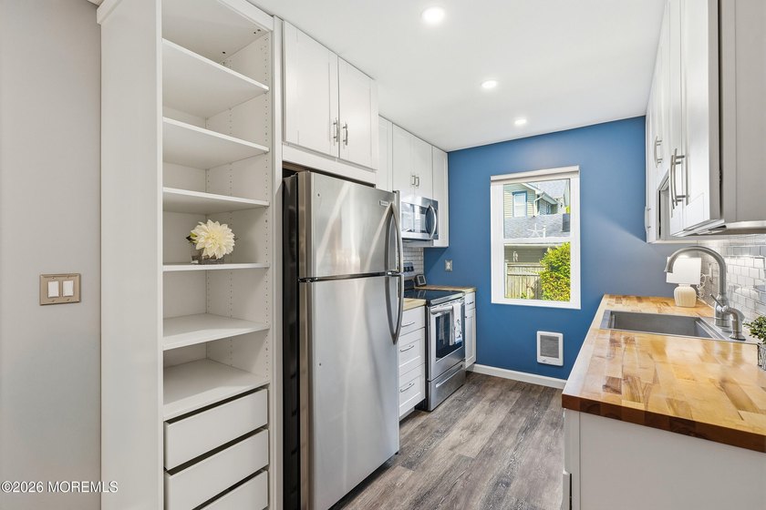 Almost 800 Sq Ft w/Option for Parking &amp; Low HOA Fees at this - photo 22