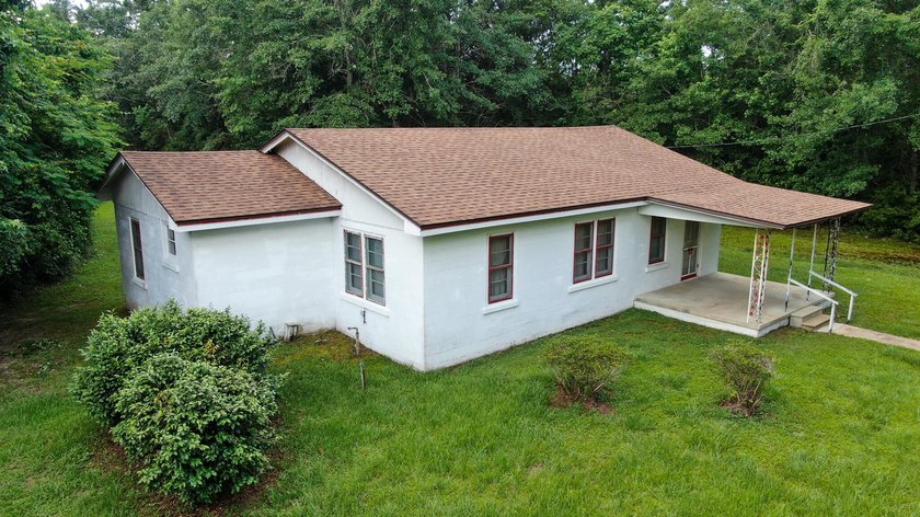 Check out this older home on almost an acre in the heart of town - photo 11