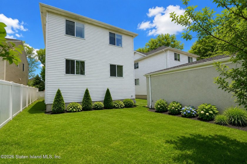 Welcome to 172 Mac Gregor Street, a legal two-family detached - photo 3