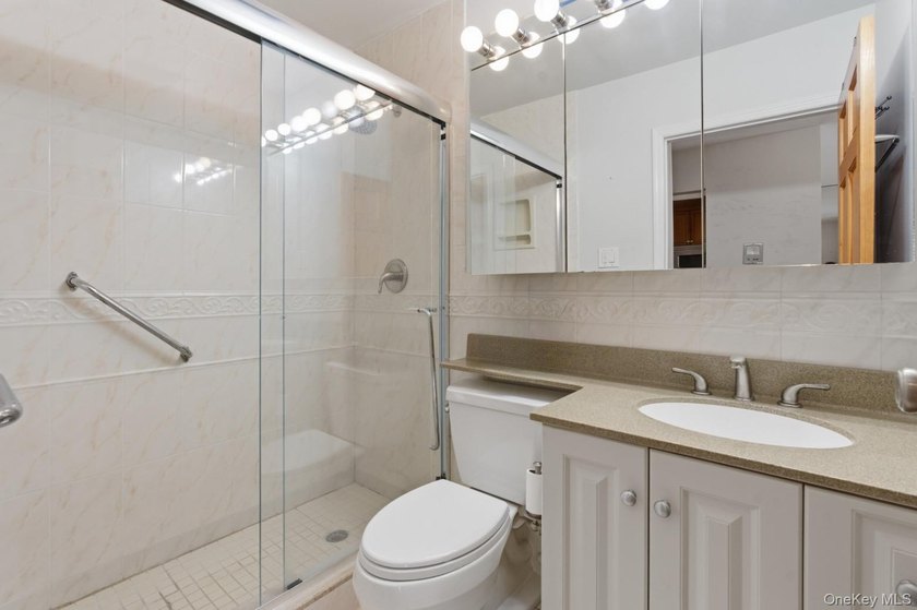Welcome to The Baybridge, a private gated condominium community - photo 13