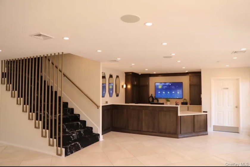 Welcome to The Baybridge, a private gated condominium community - photo 25