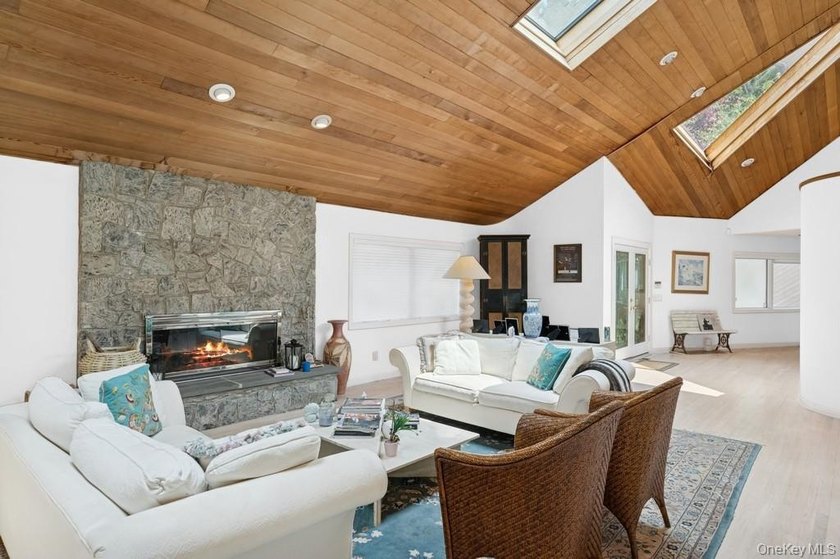 Tucked away on 1.4 acres of lush, landscaped grounds, this - photo 6