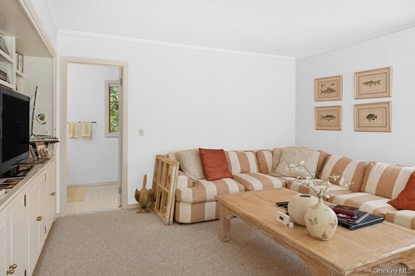 Tucked away on 1.4 acres of lush, landscaped grounds, this - photo 9
