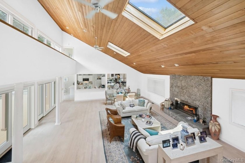Tucked away on 1.4 acres of lush, landscaped grounds, this - photo 10