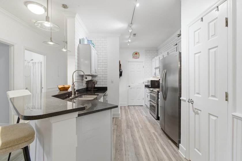 Get your summer fun game ON! Easy living is yours in this well - photo 32