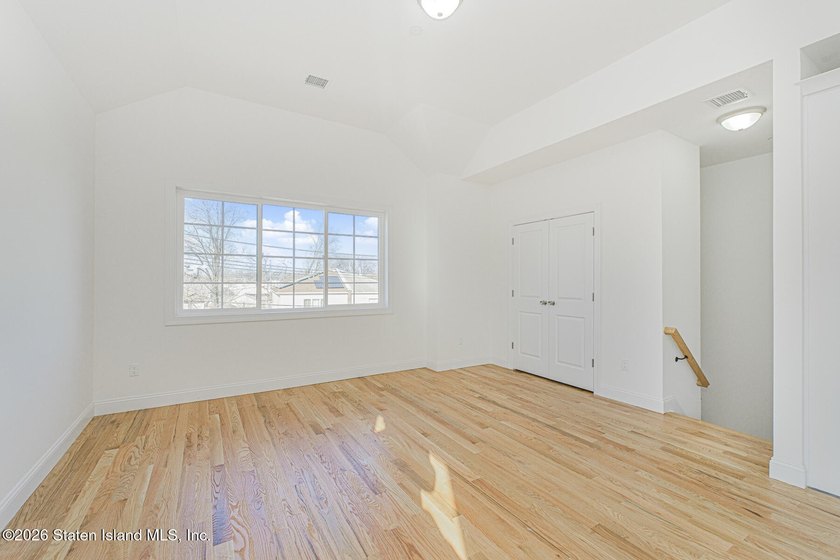 Brand-new 6 over 6 two-family home located in the desirable - photo 5