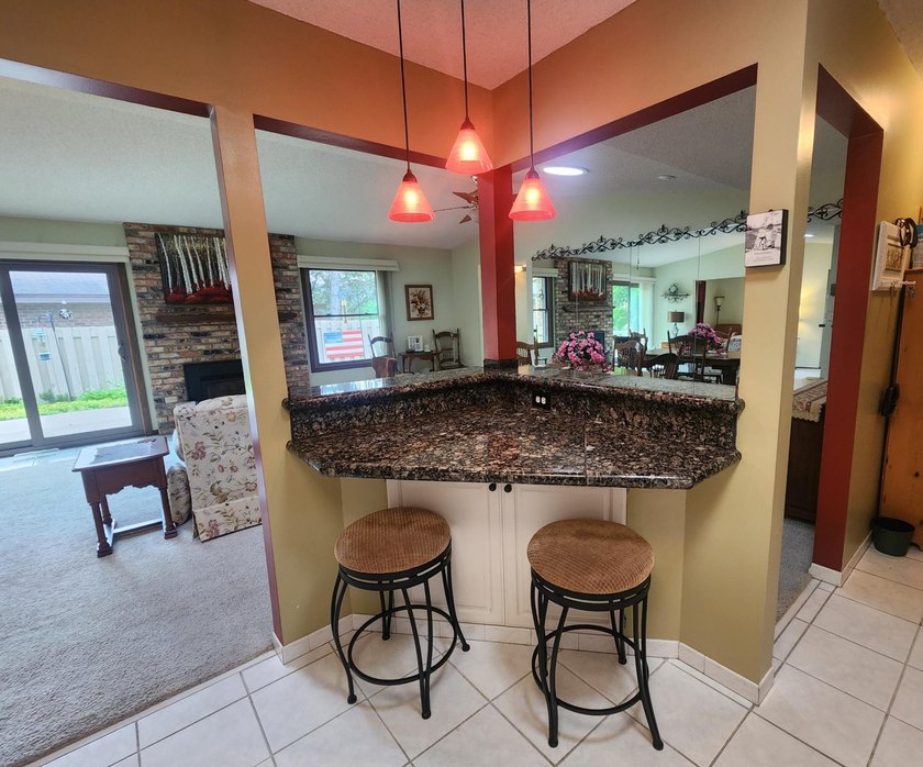Welcome to Cimarron Ponds, and the Kingwood one-level townhome - photo 8