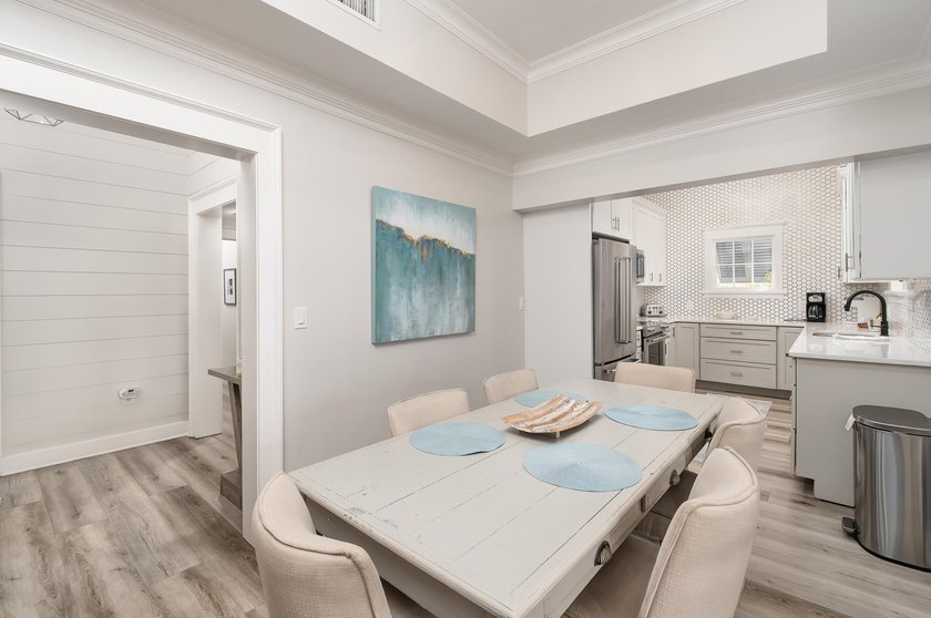 Thoughtfully redesigned with a refined coastal aesthetic, the - photo 5