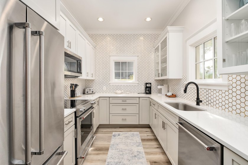 Thoughtfully redesigned with a refined coastal aesthetic, the - photo 7