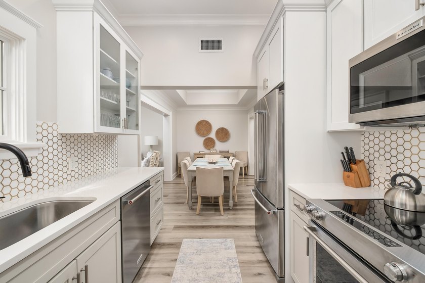 Thoughtfully redesigned with a refined coastal aesthetic, the - photo 8