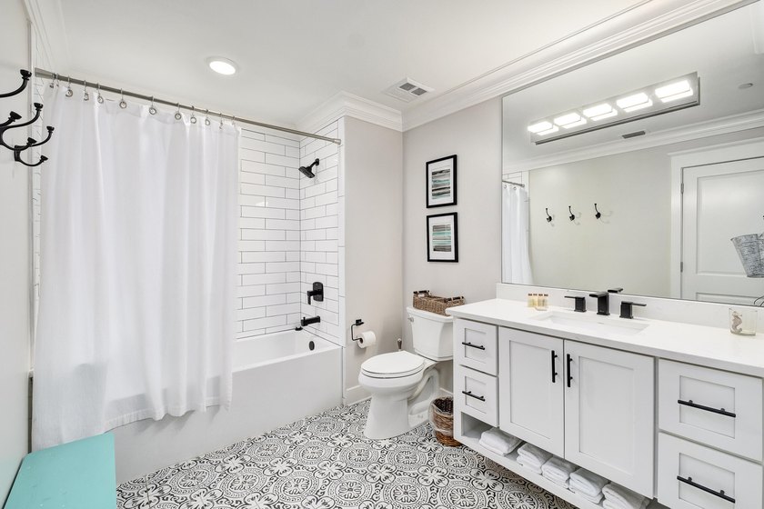 Thoughtfully redesigned with a refined coastal aesthetic, the - photo 10