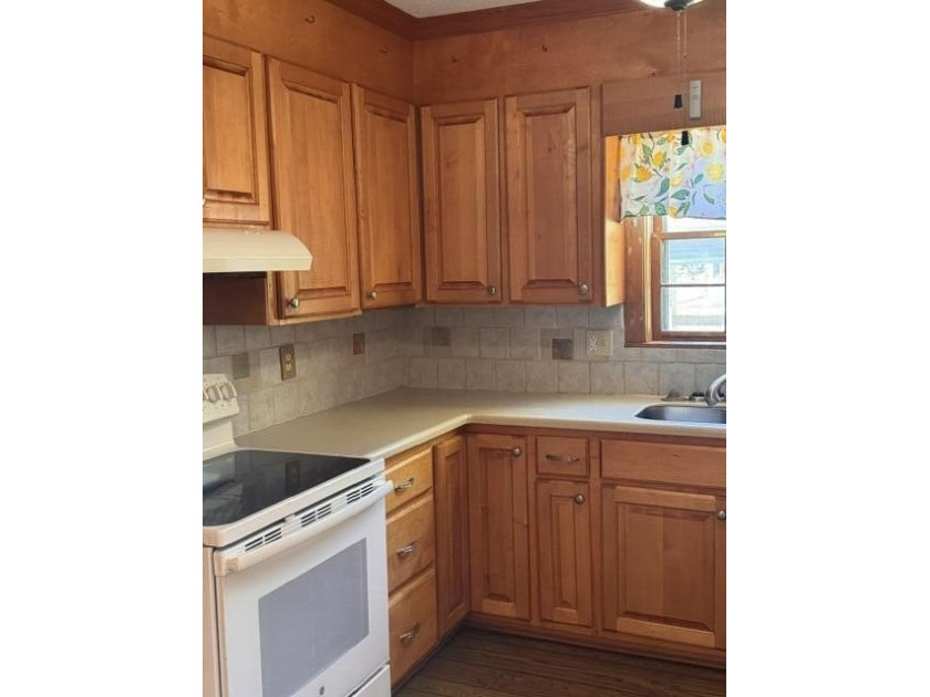 Discover tranquility &amp; charm in this immaculate log cabin - photo 4
