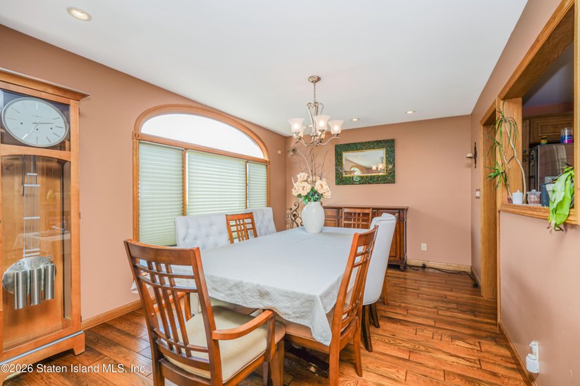 Located on a beautiful tree-lined block in the heart of - photo 6