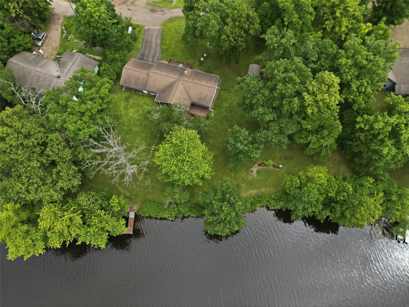 Updated house with the nicest frontage on Old Abe Lake, 200ft of - photo 6