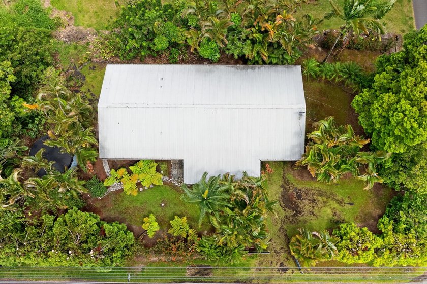Nestled on a beautifully landscaped, fairly level lot surrounded - photo 22