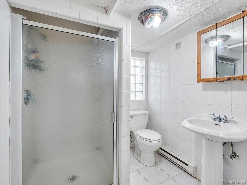 Welcome to 1128 E 84th Street, a well-maintained two-family home - photo 26