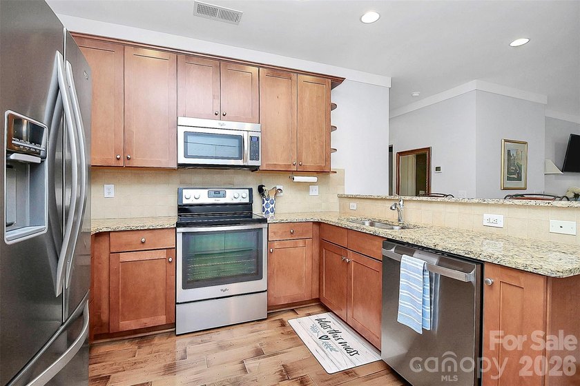 Discover this Davidson gem ideally located just moments from - photo 4