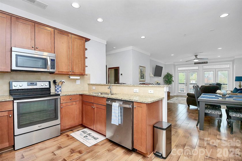 Discover this Davidson gem ideally located just moments from - photo 5